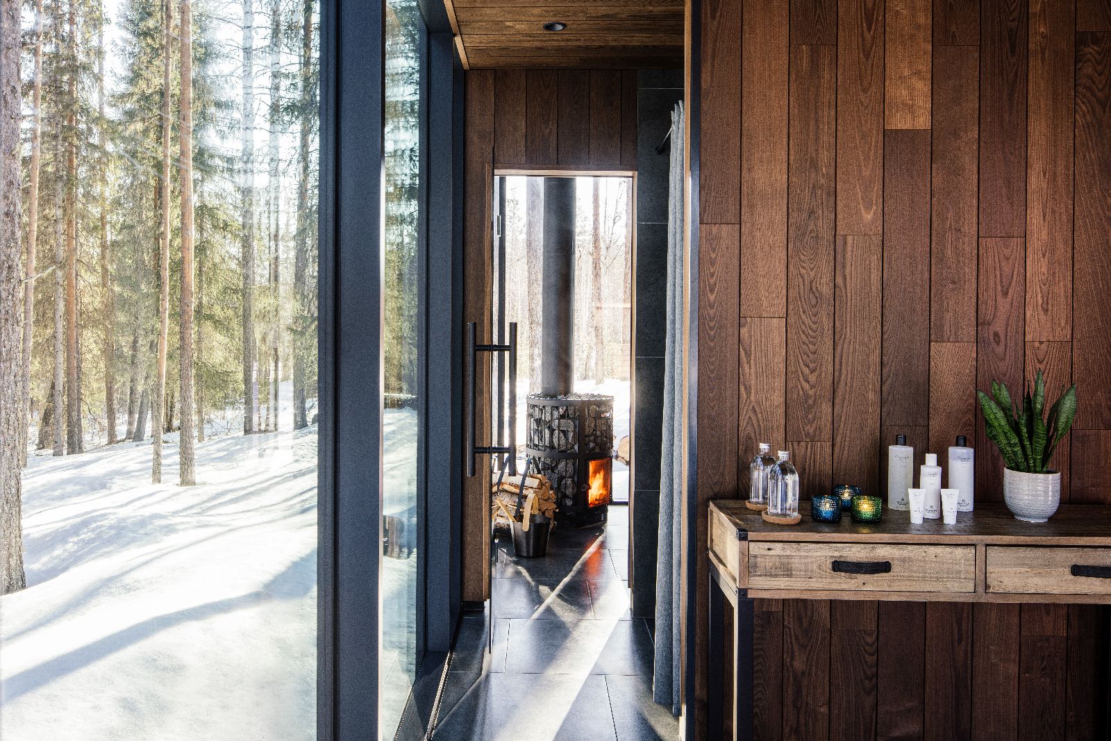 Minimalistic and Scandinavian designed lodge with forest views  in luxury Loggers Lodge hotel in Sweden