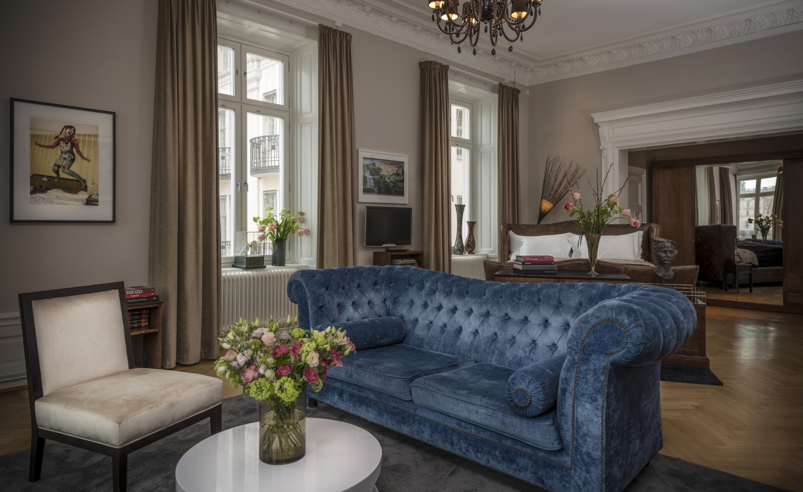 Suite at Lydmar Hotel with big couch and plenty of flowers