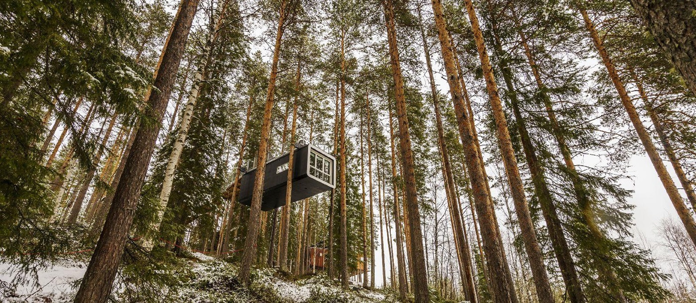 Cabin floating in the treetops at the Treehotel in Sweden