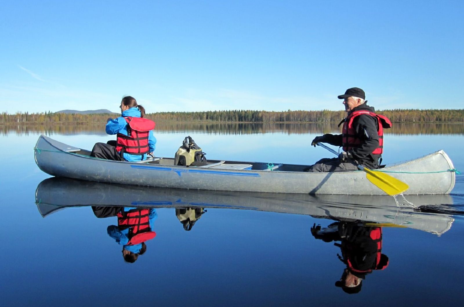 Kayaking on tranquil lakes from the Treehotel in Sweden
