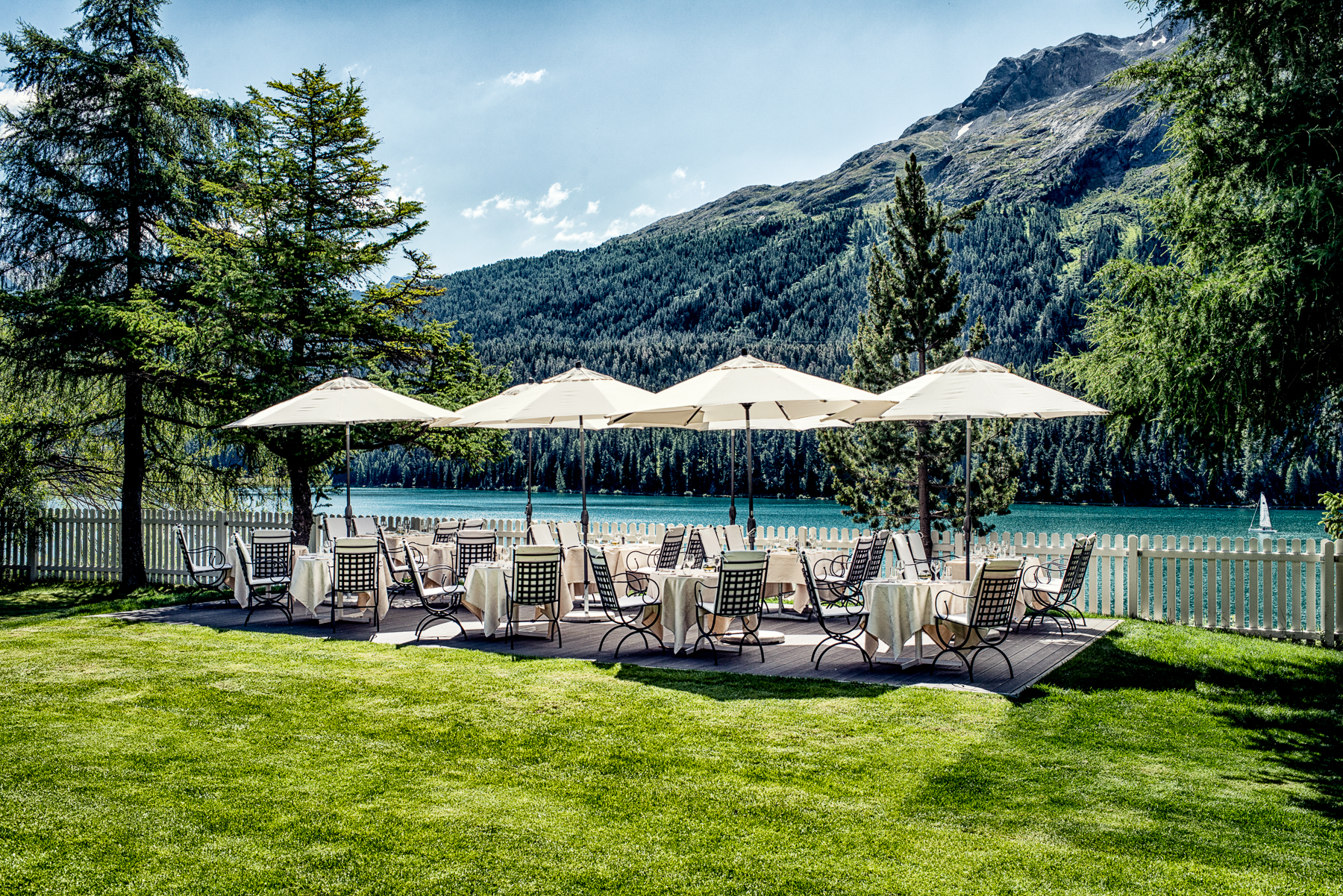Seating area overlooking the lake at Badrutt's Palace in St Moritz