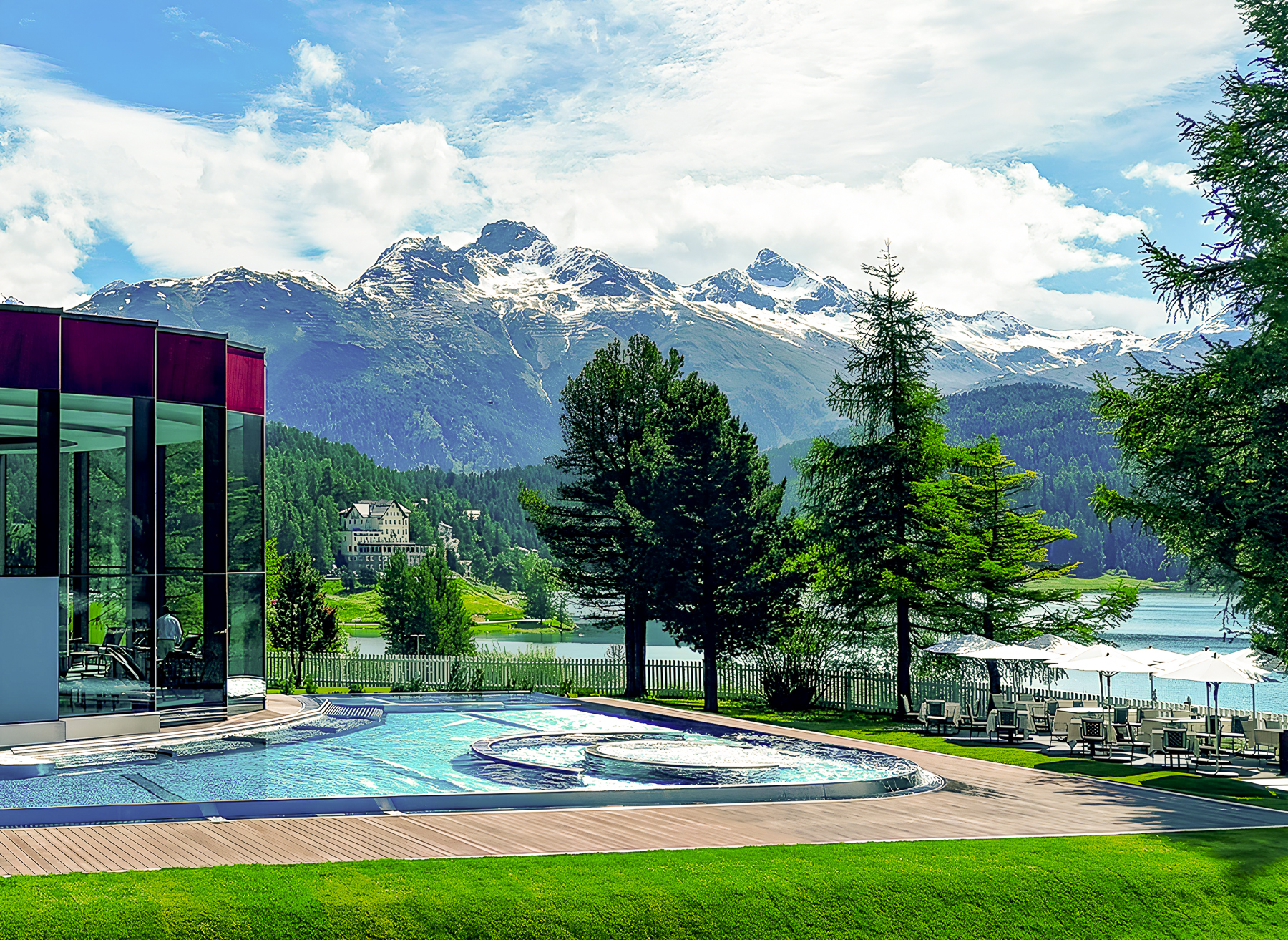 Gardens and outdoor wellness pool at Badrutt's Palace luxury hotel in St Moritz