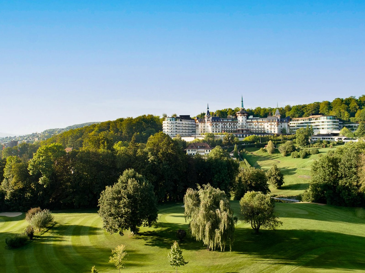 Exterior view of the Dolder Grand luxury hotel and golf course in Zurich