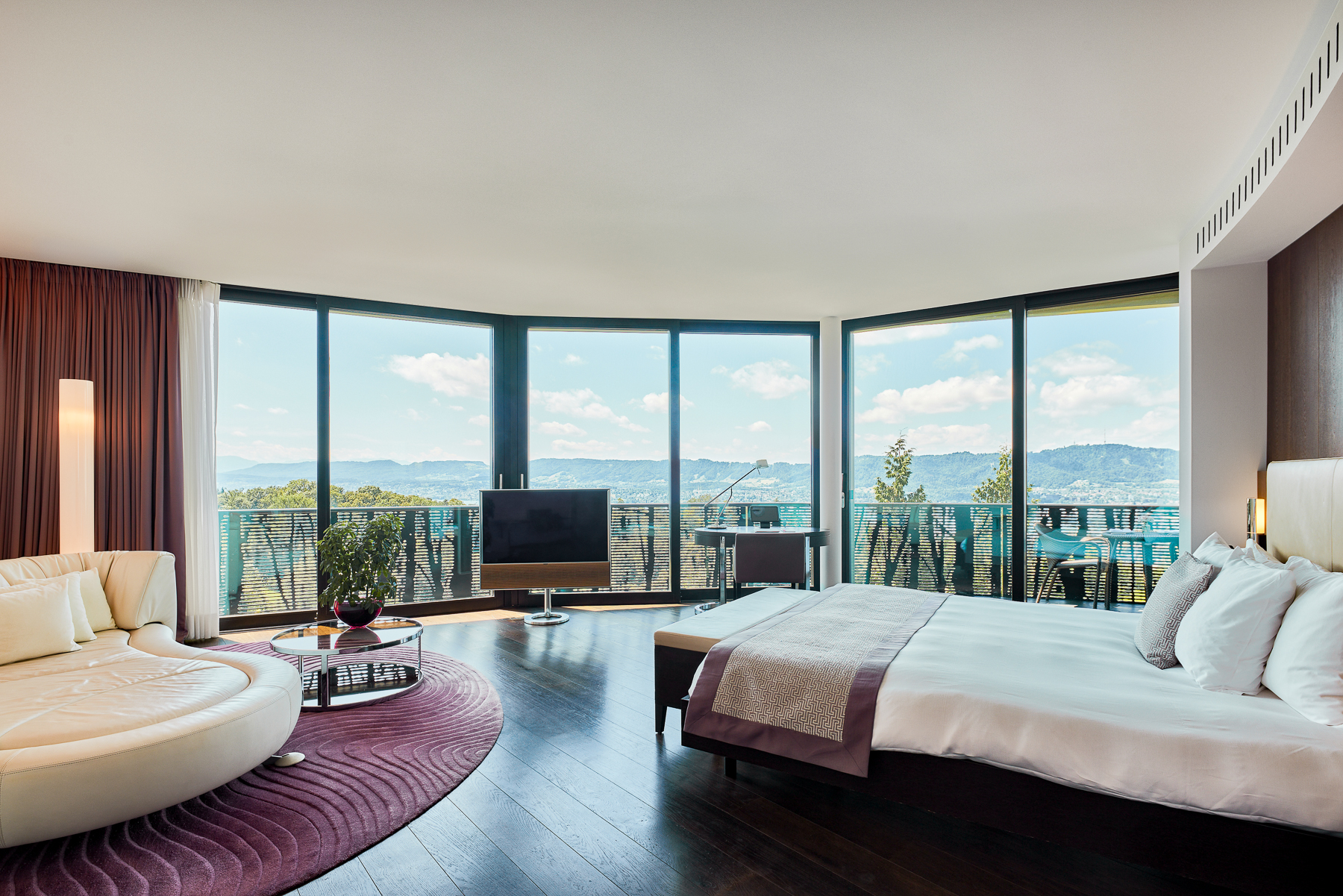 Purple suite bedroom at the Dolder Grand luxury hotel in Zurich