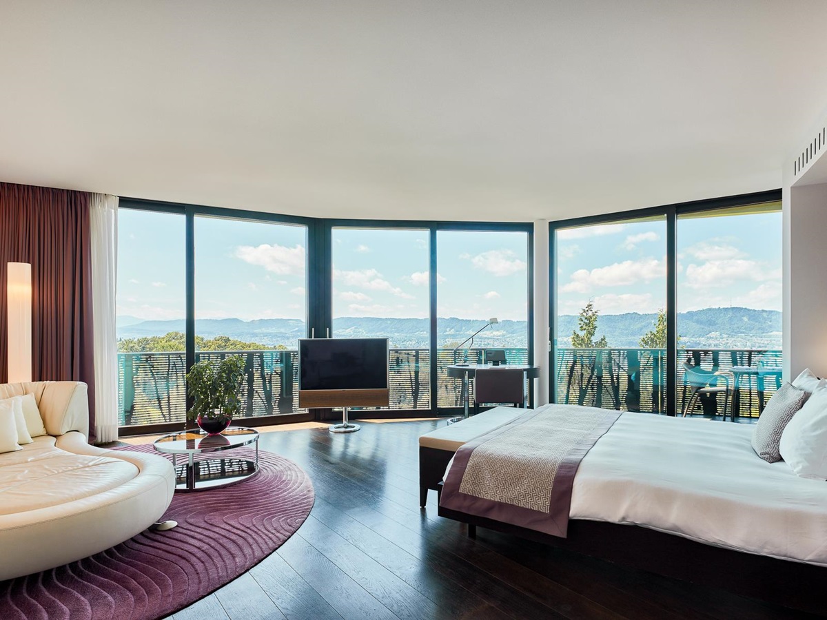 Purple suite bedroom at the Dolder Grand luxury hotel in Zurich