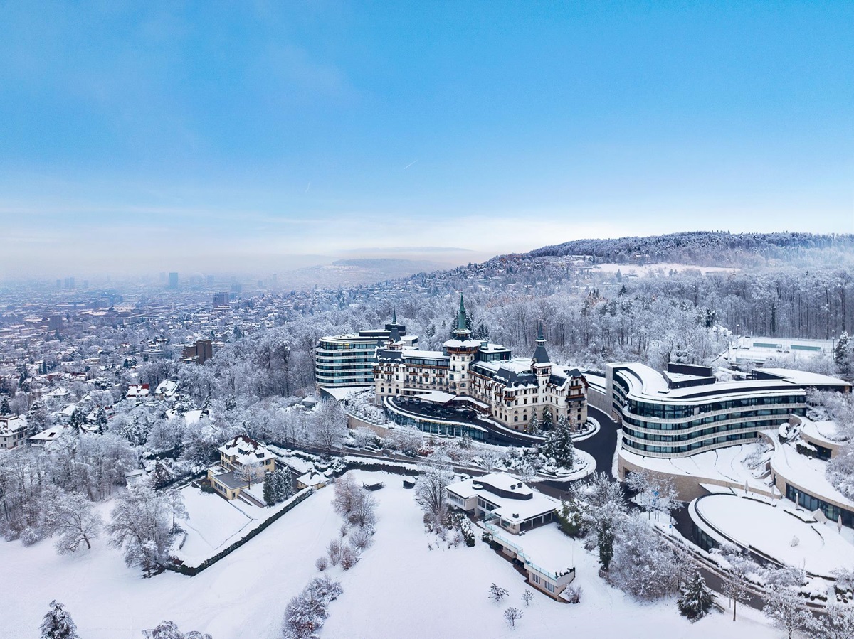 Exterior view of the Dolder Grand luxury hotel in Zurich during winter