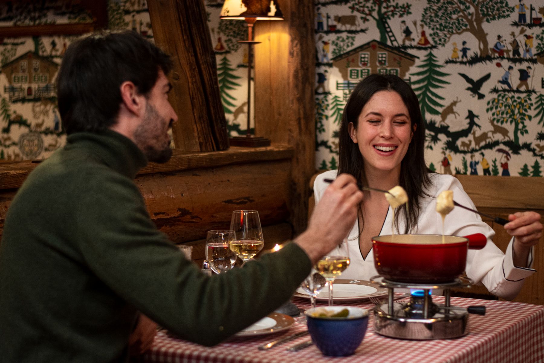Guests enjoying the cuisine at Gstaad Palace in Switzerland