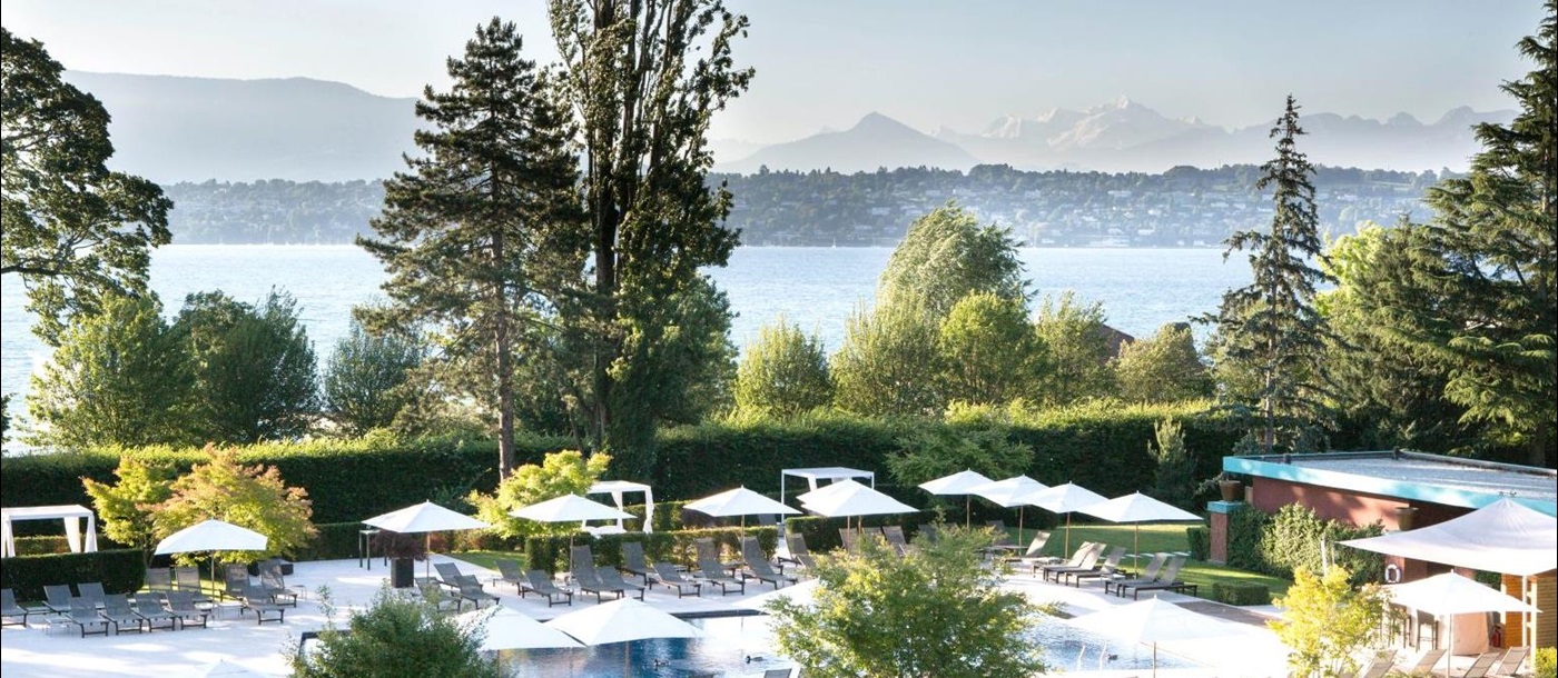 Swimming pool and lake views at La Reserve Geneva Switzerland