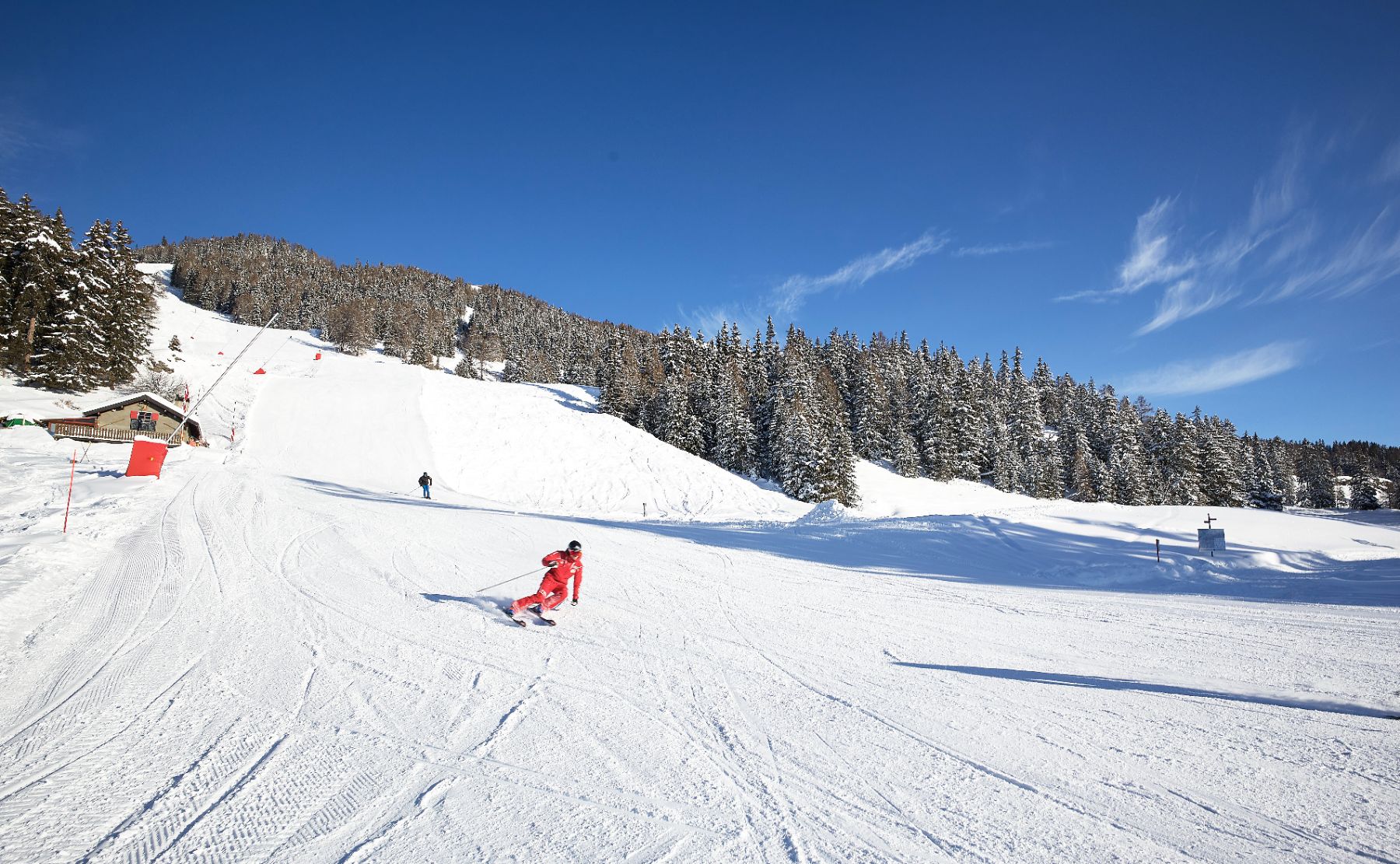 Skiing on the slopes of Le Crans in Switzerland
