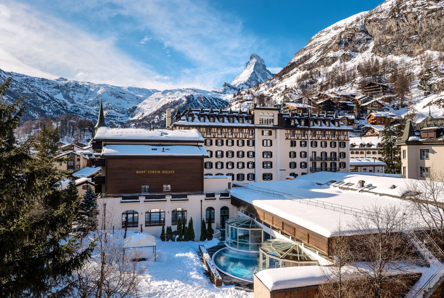 Exterior view of Mont Cervin Palace in Zermatt in winter