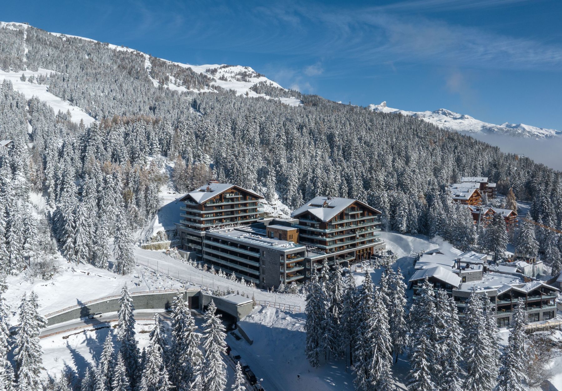 Exterior view of Six Senses Crans Montana during the winter