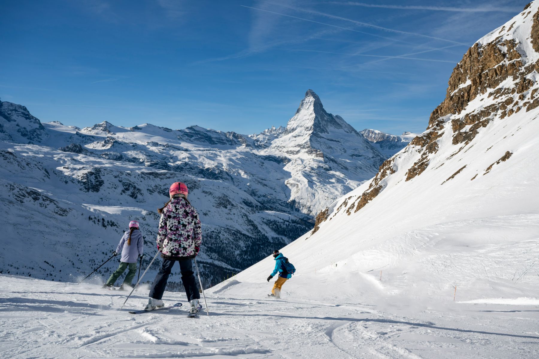 A family skiing in Switzerland
