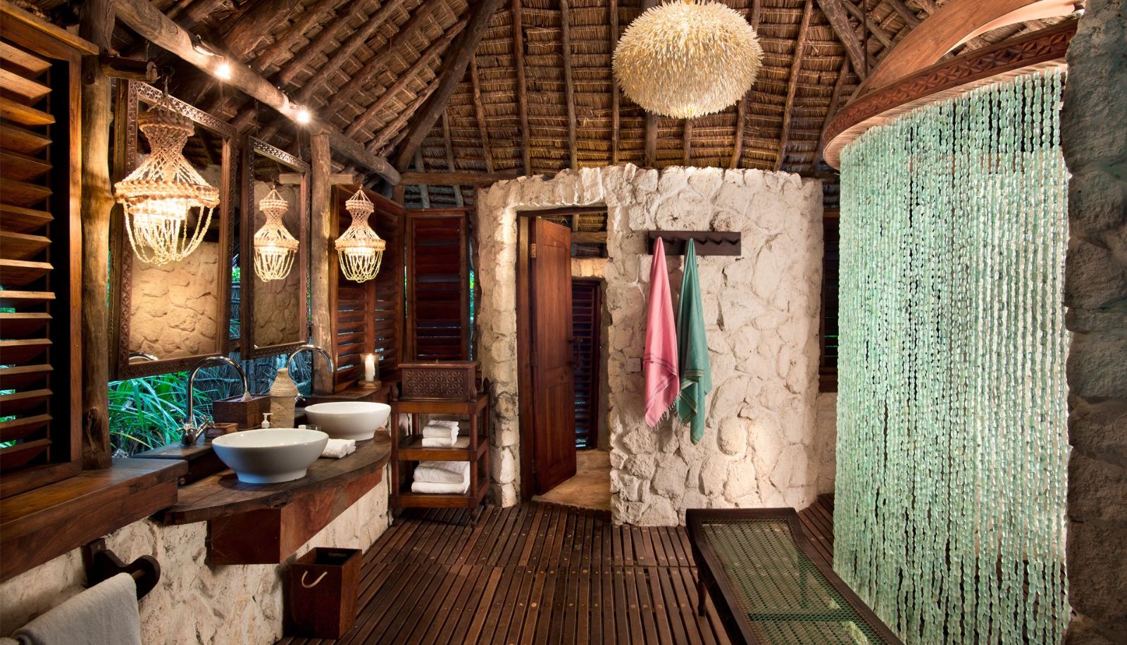 En suite bathroom of a banda at andBeyond Mnemba Island Lodge, Zanzibar