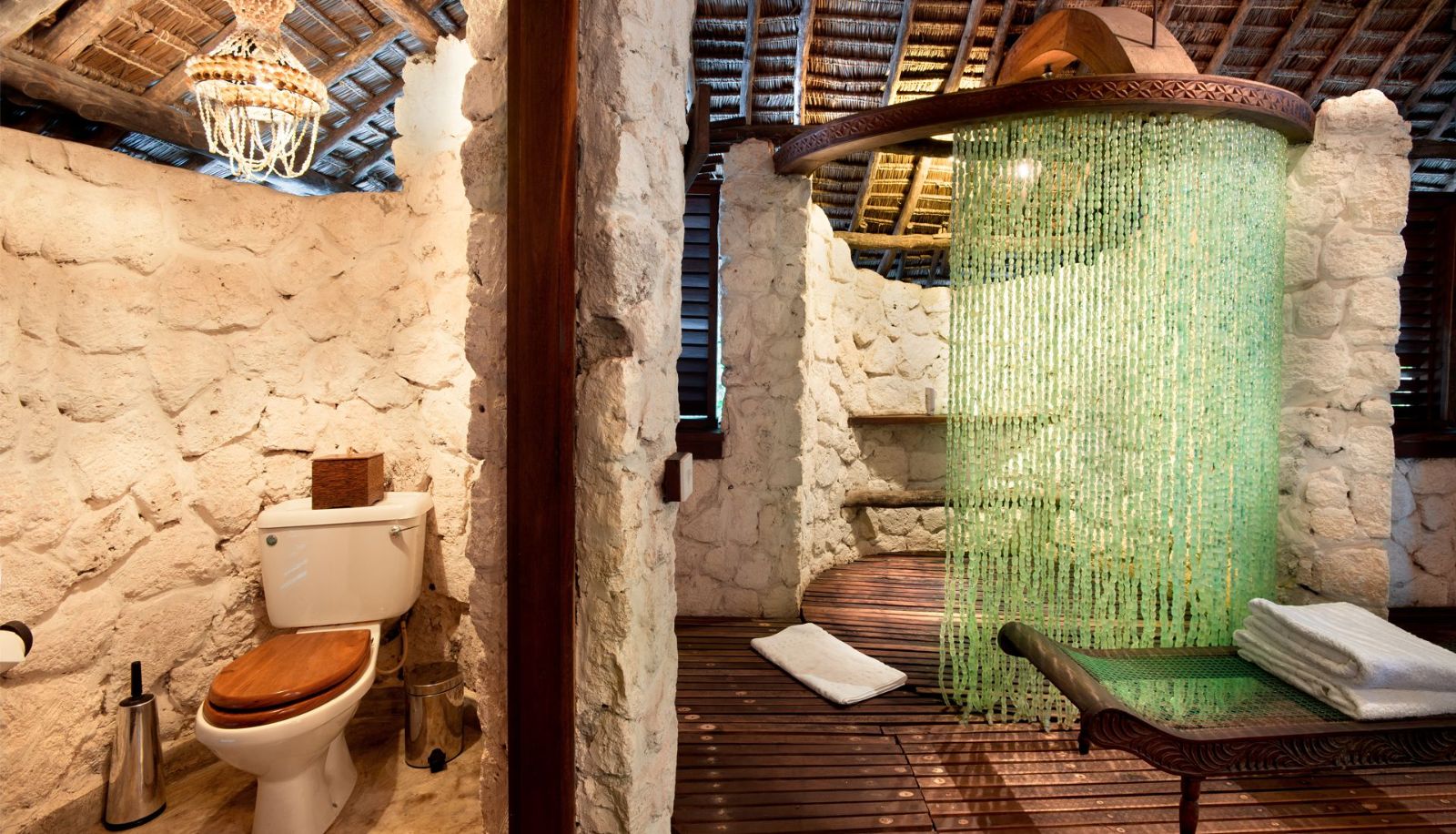 En suite bathroom of a banda at andBeyond Mnemba Island Lodge, Zanzibar