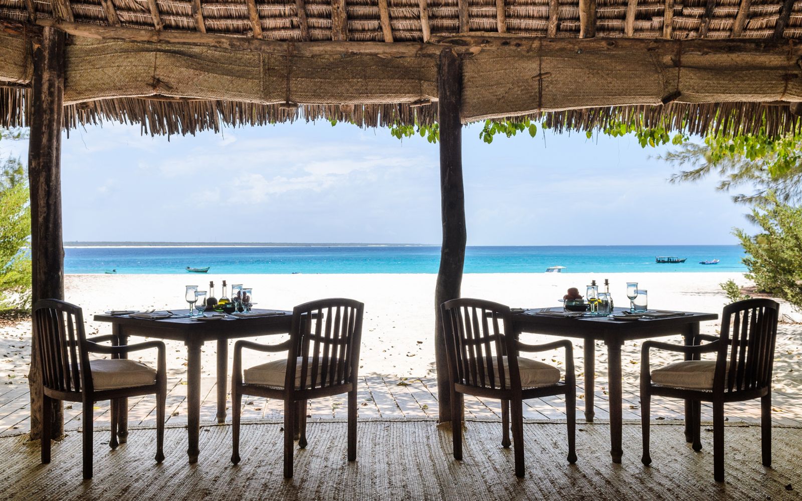 Beachfront dining at andBeyond Mnemba Island Lodge, Zanzibar