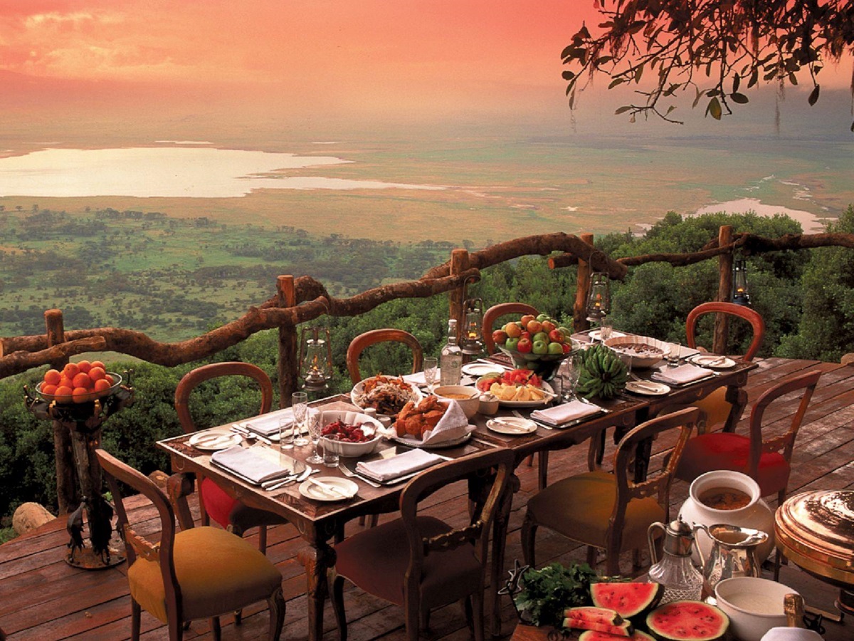 Sunrise over the dining deck at &beyond Ngorongoro Crater Lodge in Tanzania