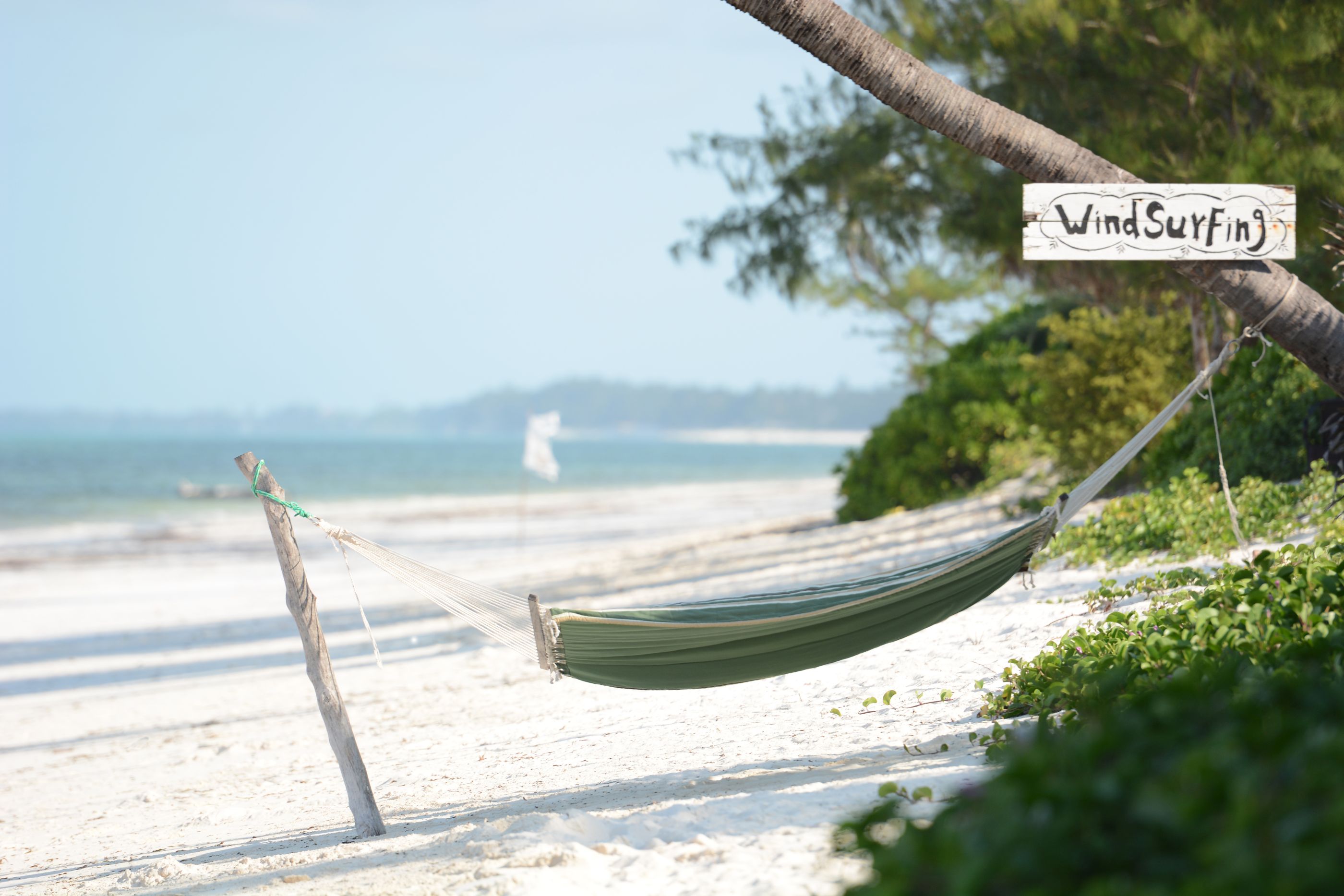A hammock on the beach at Breezes Beach Club