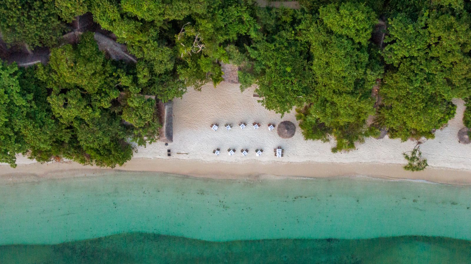 Aerial shot of the beach at luxury hotel Fundu Lagoon on Zanzibar