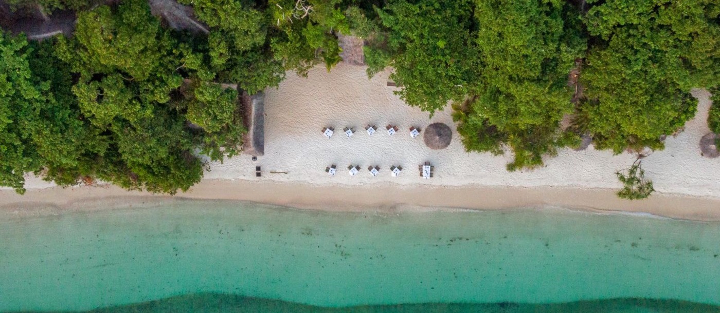 Aerial shot of the beach at luxury hotel Fundu Lagoon on Zanzibar
