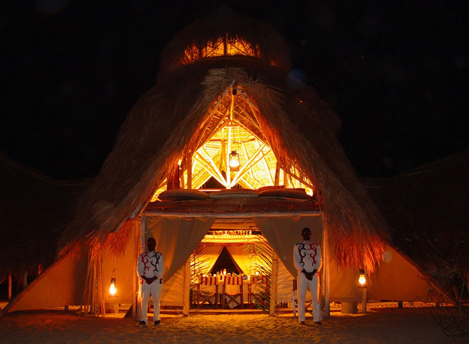 Entrance of dining area at night at Greystroke Mahale in Tanzania 