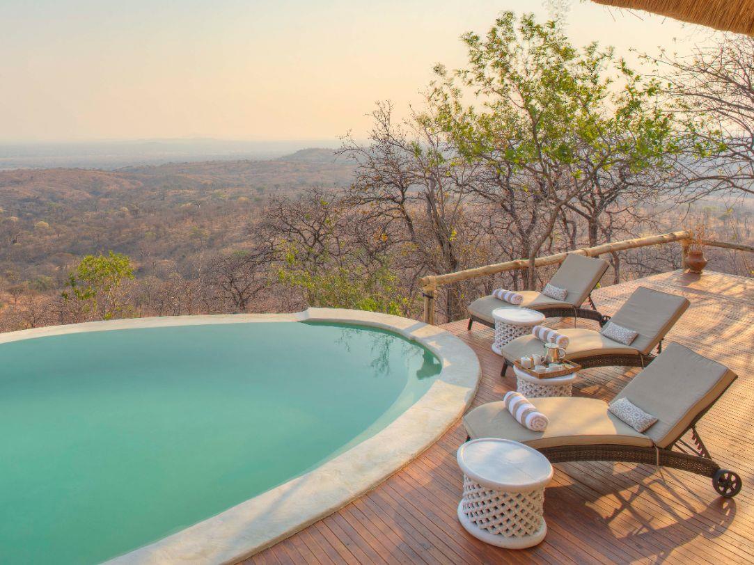 Swimming pool with views over the Ruaha National Park at Ikuka Safari Camp