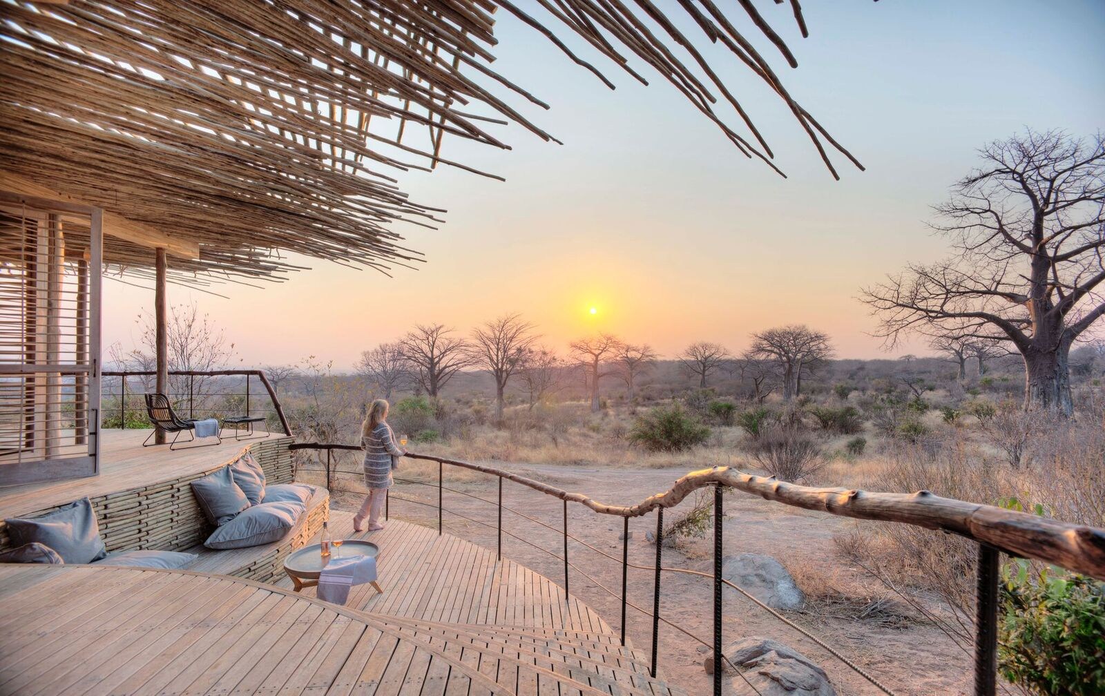 a room deck during sunset at Jabali Ridge, Tanzania