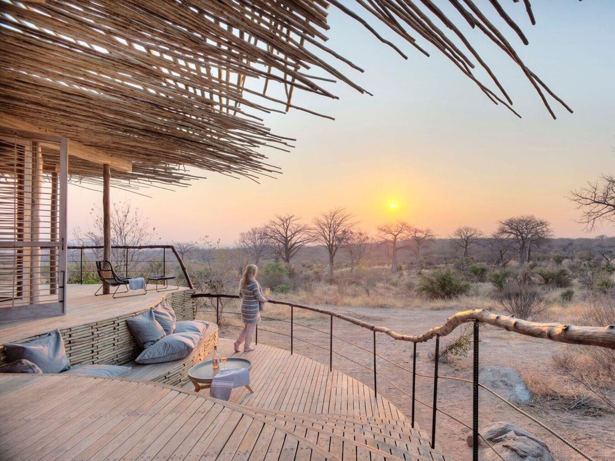 a room deck during sunset at Jabali Ridge, Tanzania