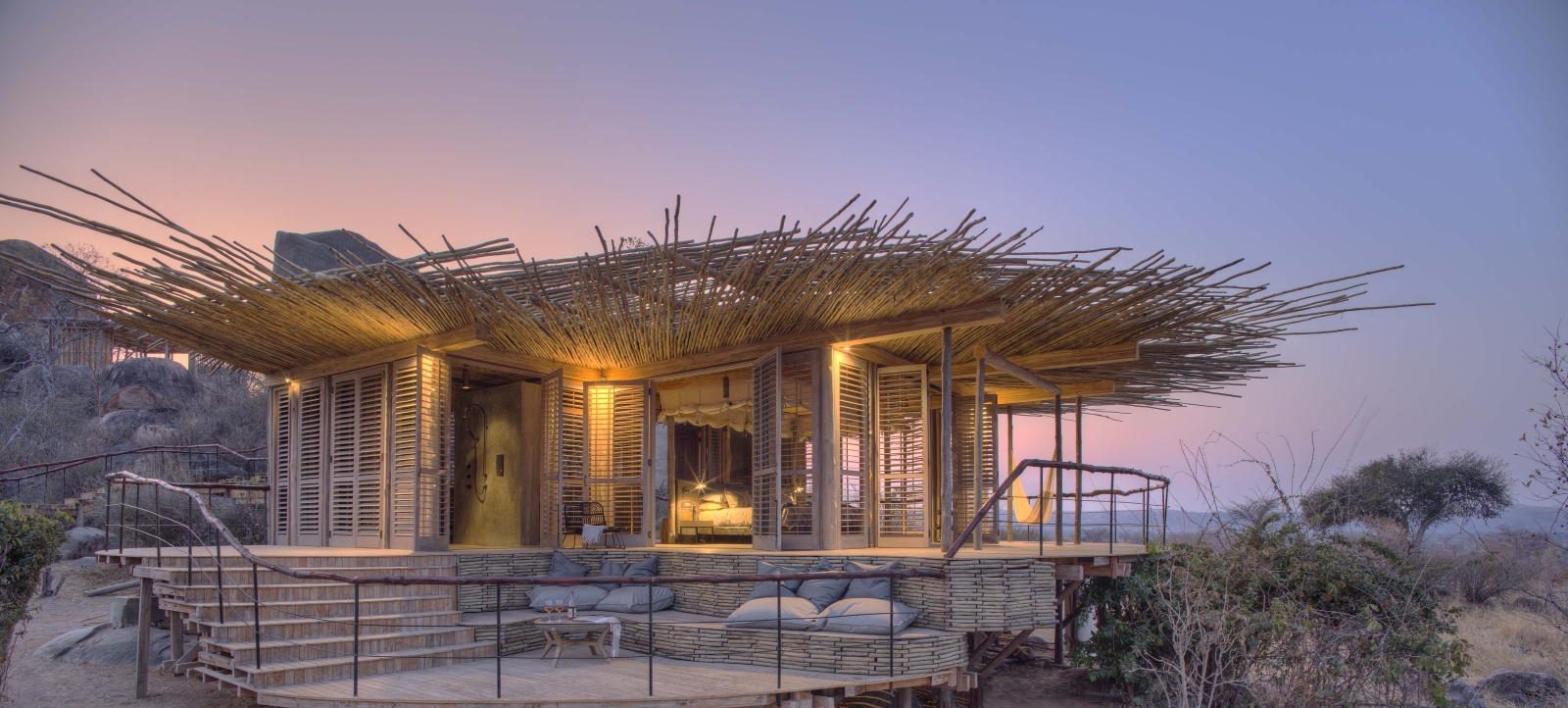 Exterior view of double room with outdoor seating area