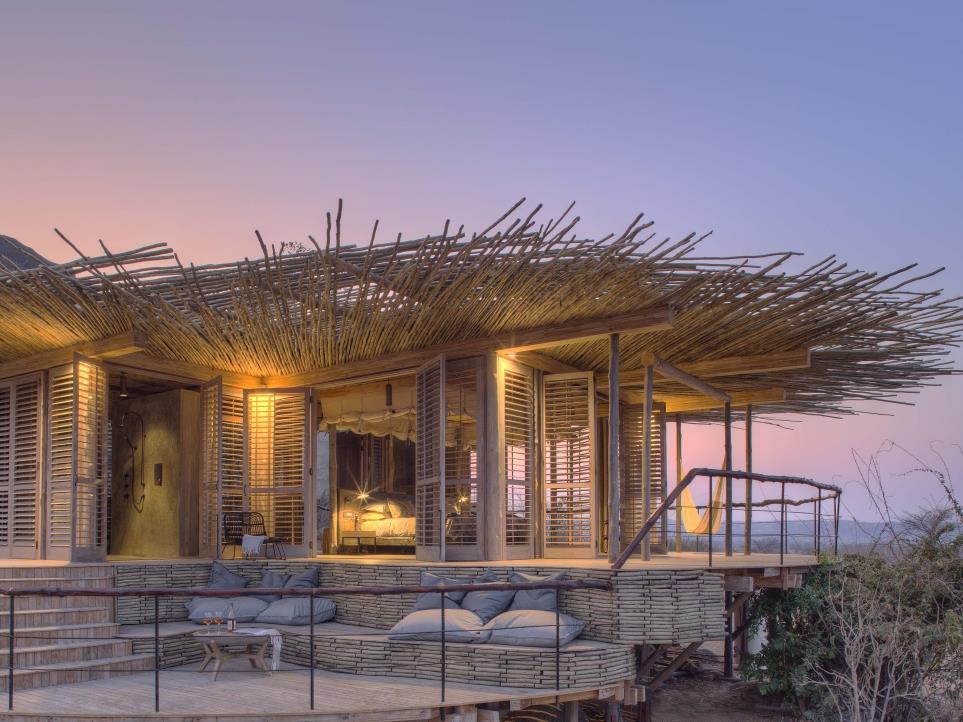 Exterior view of double room with outdoor seating area