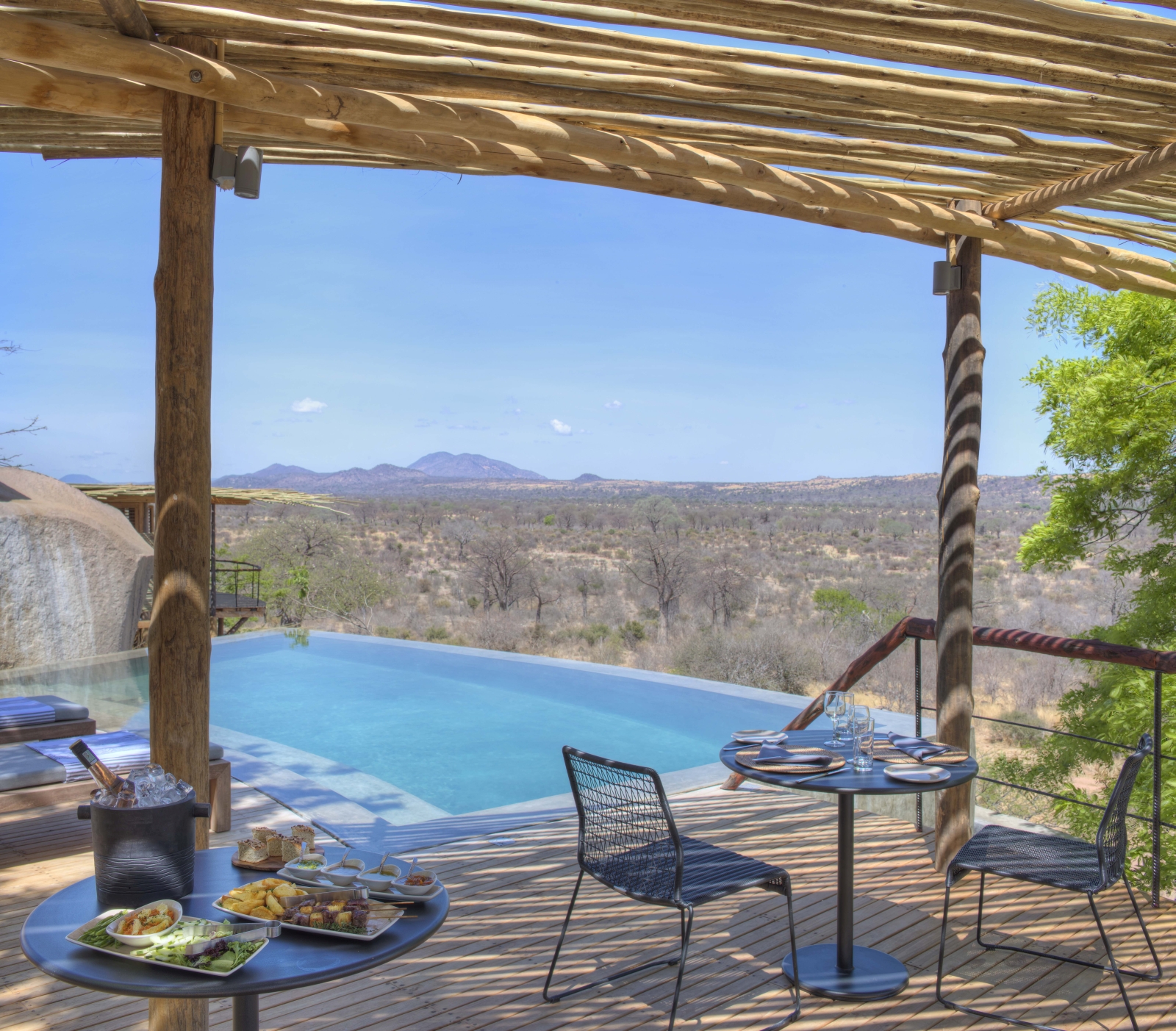 shaded seating area and infinity pool at Jabali Ridge