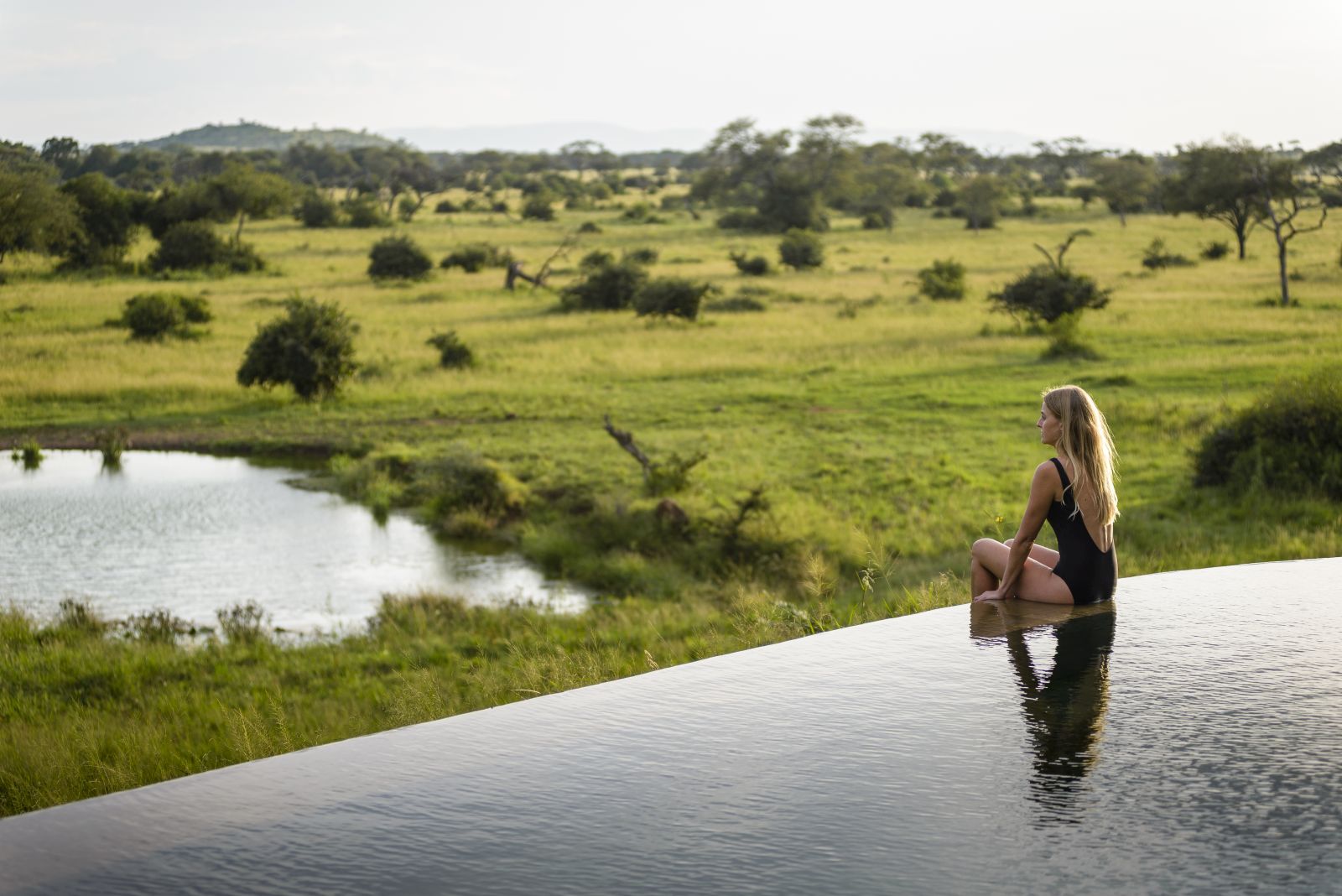 Pool and waterhole at Singita Faru Faru Lodge in Tanzania