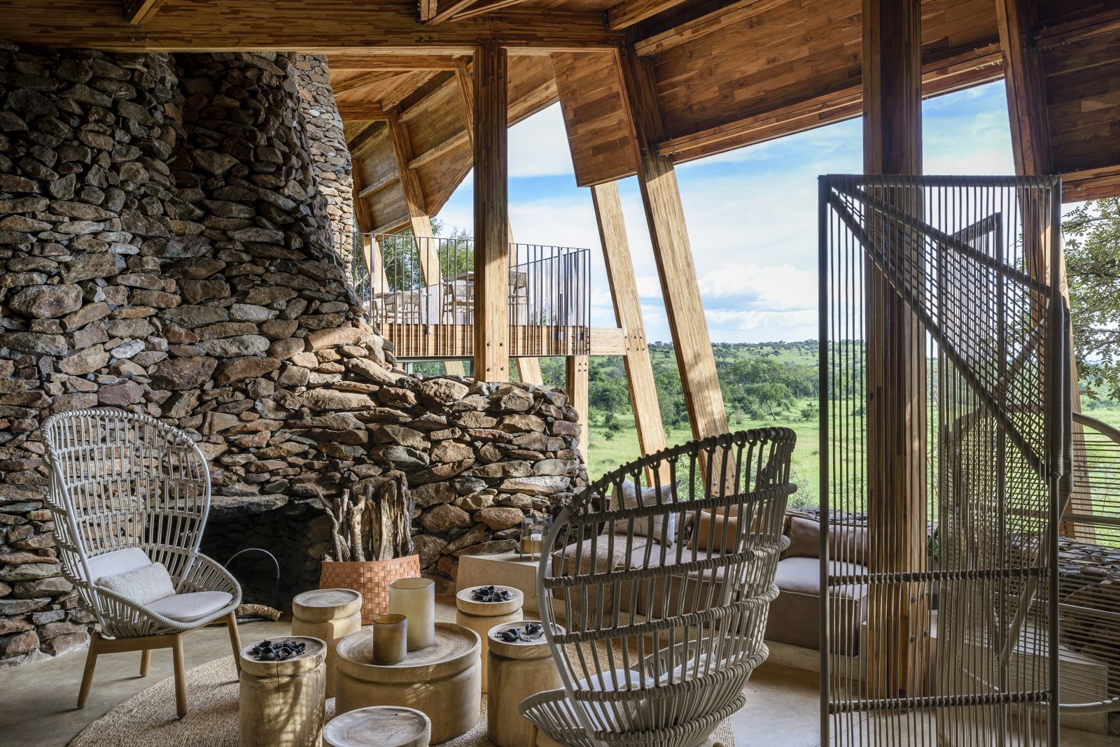 Sitting area and deck view at Singita Faru Faru Lodge in Tanzania