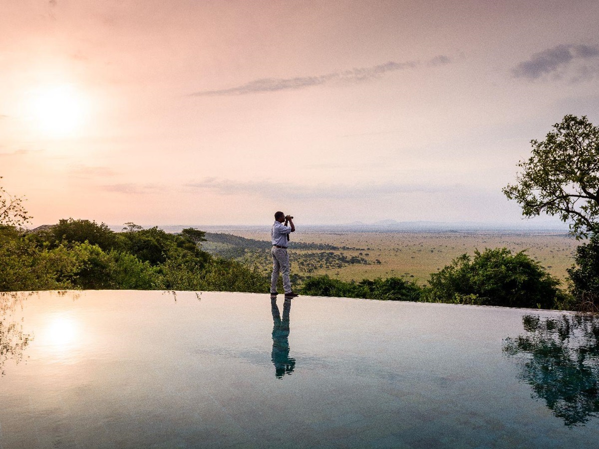 Sunset views from the swimming pool at Singita Sasakwa Lodge in Tanzania