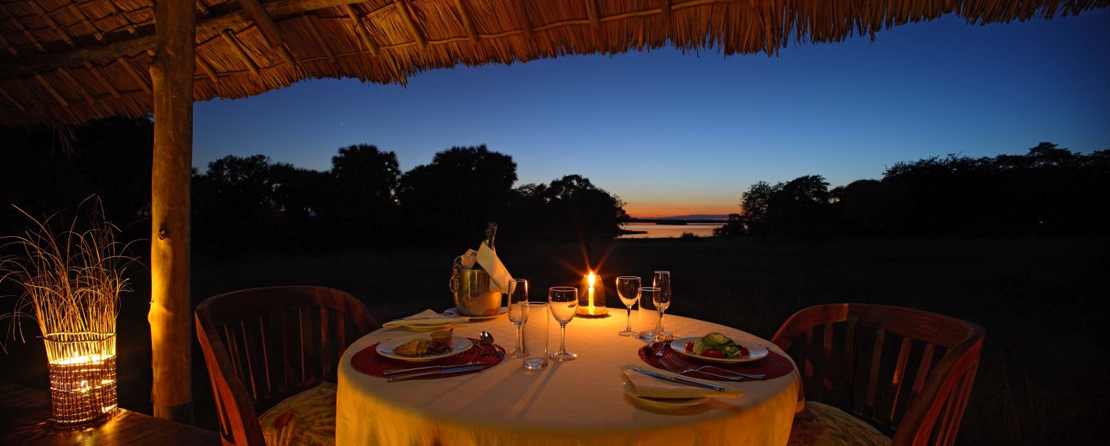 Private dining at night at Siwandu in Tanzania 