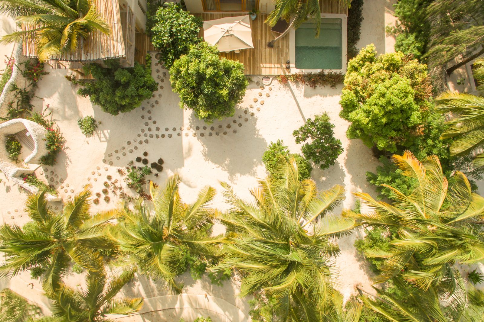 Aerial of pool and path of villa in White Sands resort in Zanzibar