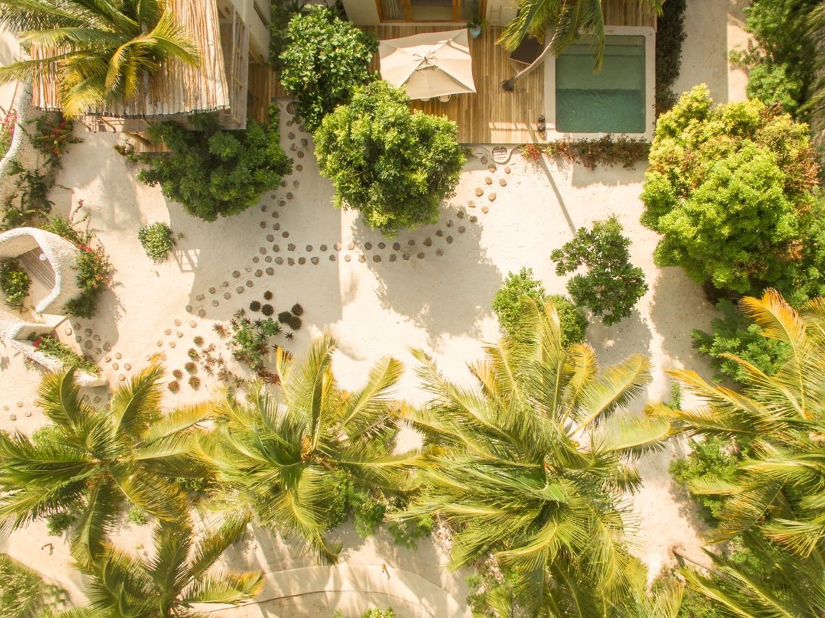 Aerial of pool and path of villa in White Sands resort in Zanzibar