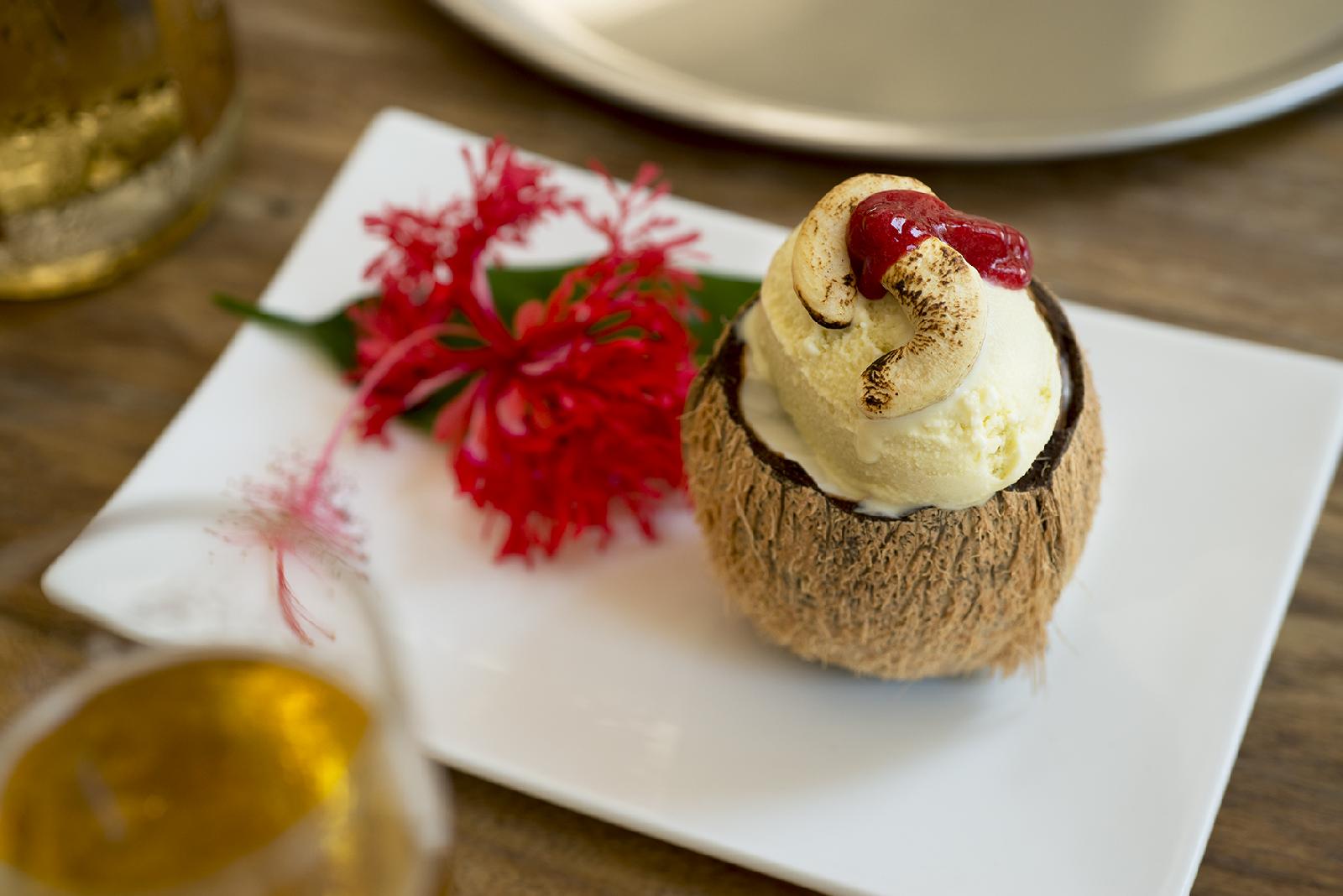 Dessert served in a coconut at Xanadu, Zanzibar