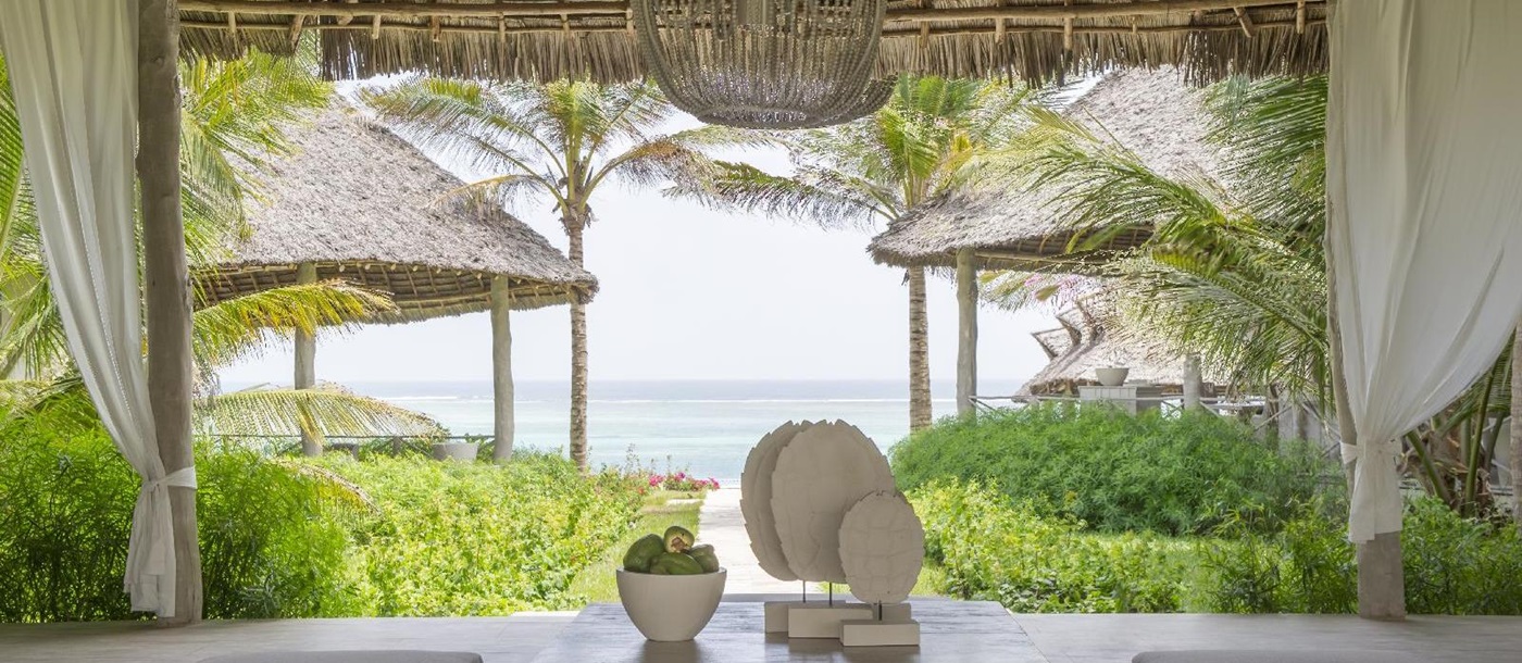 the reception with view over the ocean of the sun deck with a view over the beach at Zawadi, Tanzania