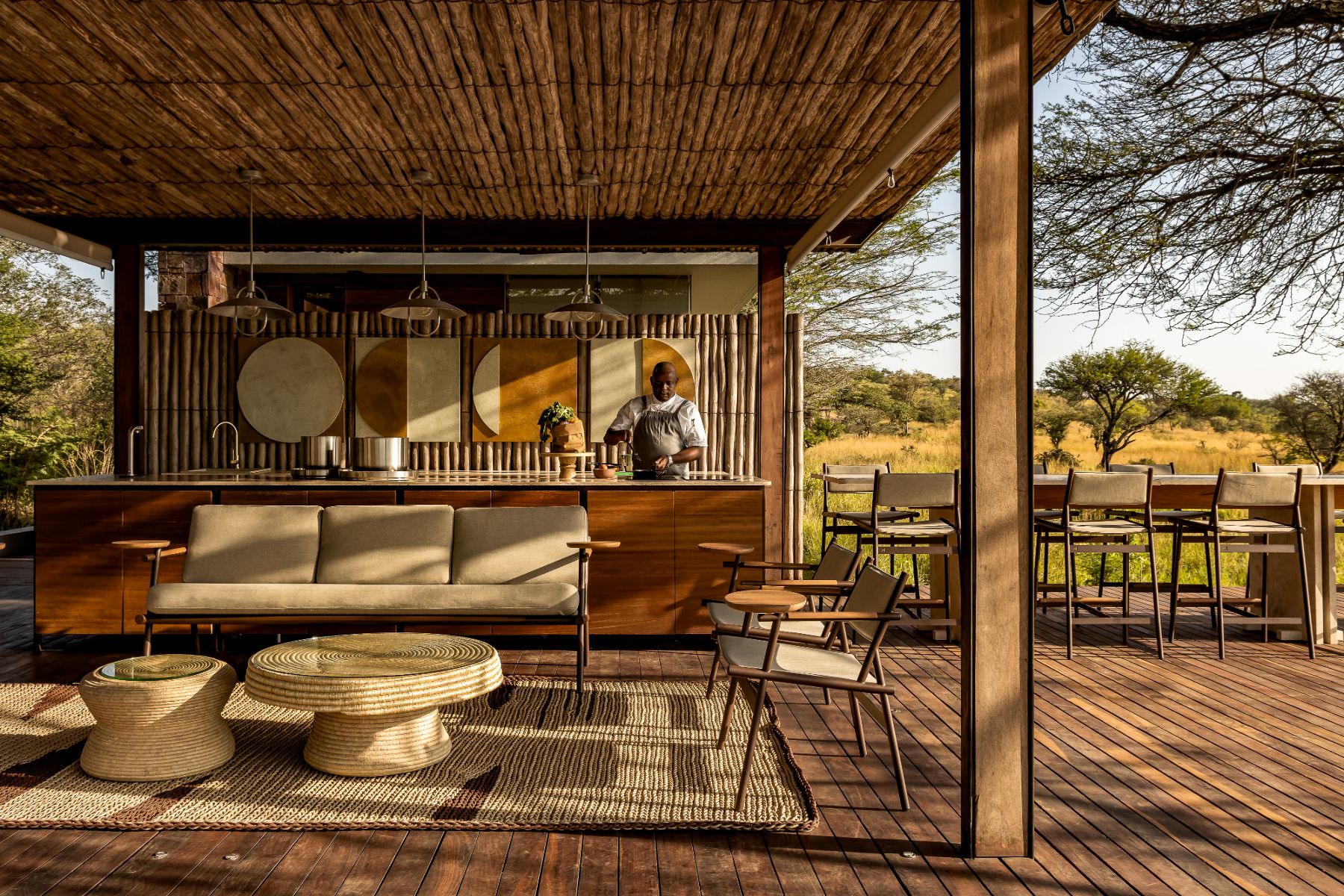 Bar and outdoor sala area at Singita Serengeti House in Tanzania