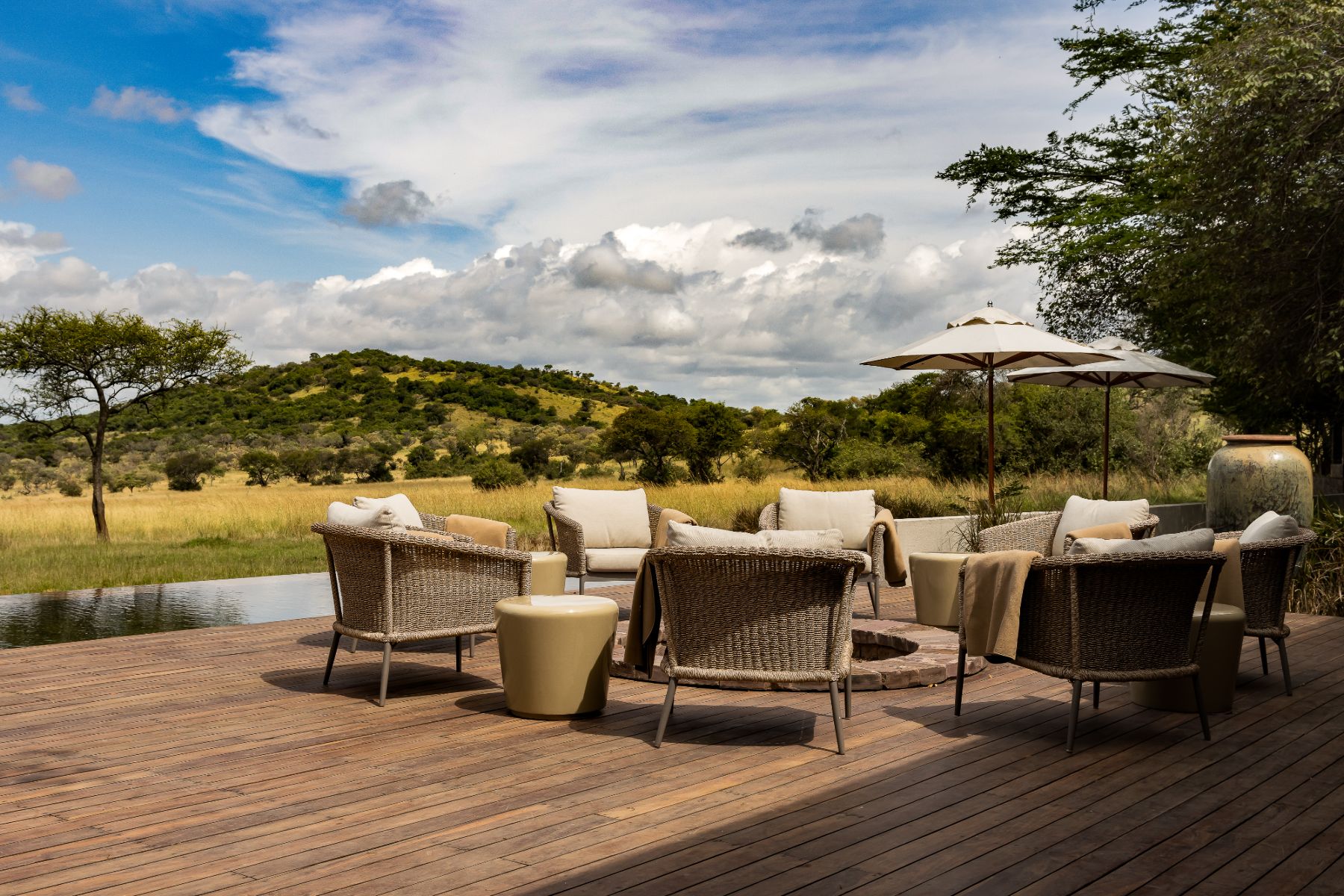 Fire pit and outdoor seating at Singita Serengeti House in Tanzania
