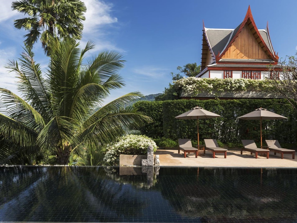 Pool and terrace area with a view of a five bedroom ocean villa at luxury resort Amanpuri
