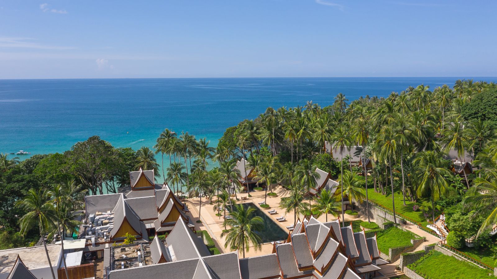 Aerial view of the main pool and reception at luxury resort Amanpuri