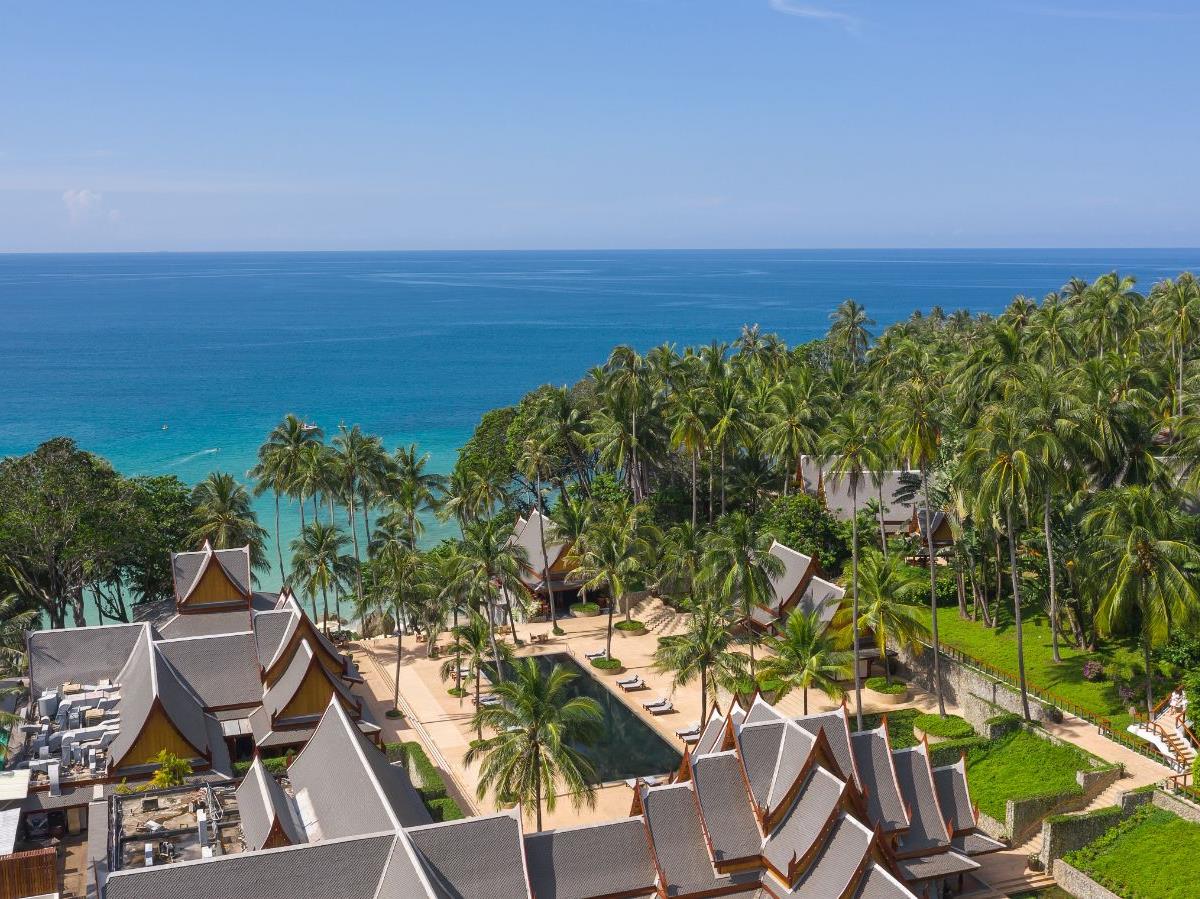 Aerial view of the main pool and reception at luxury resort Amanpuri