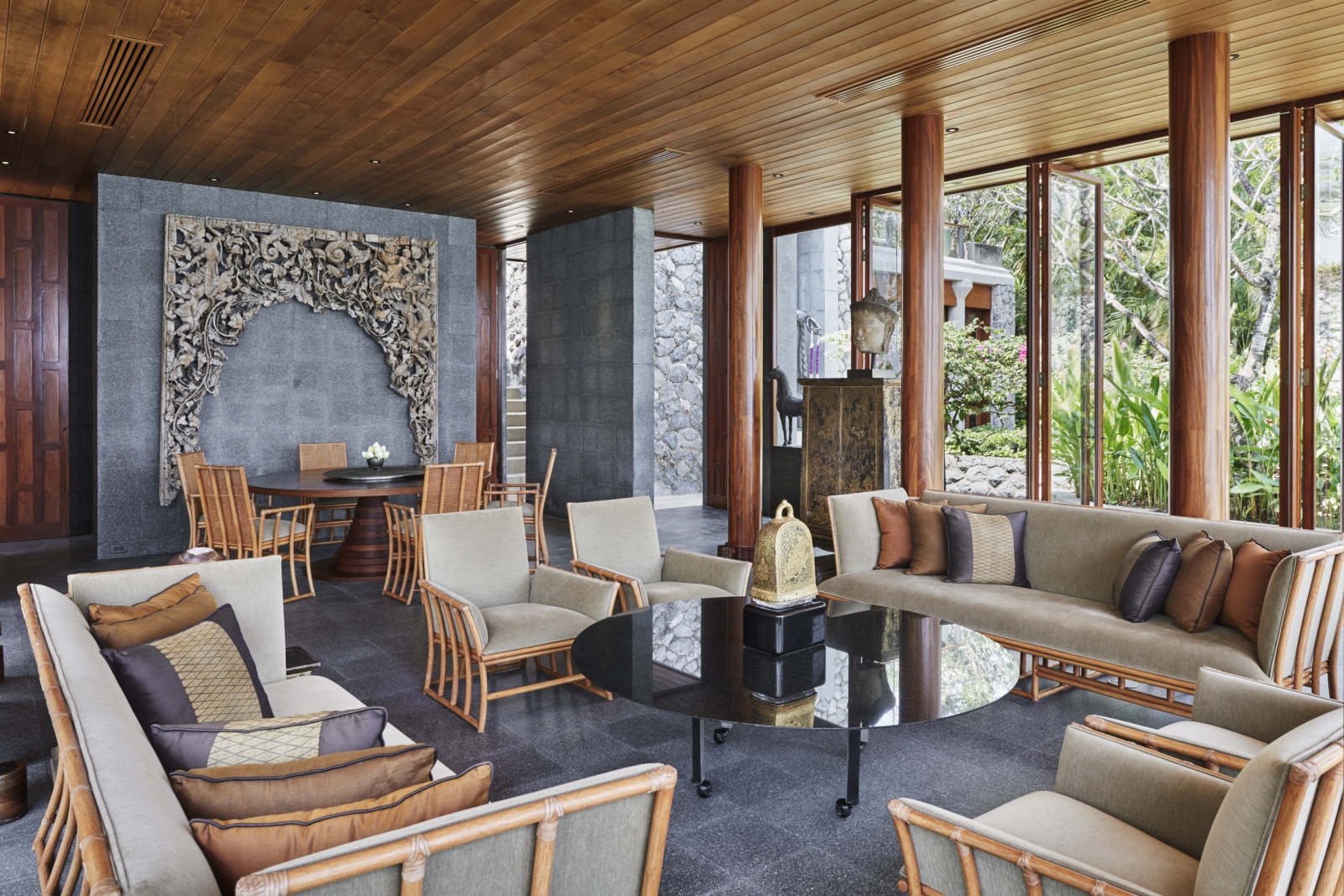 Living area in an ocean villa with seating and coffee table