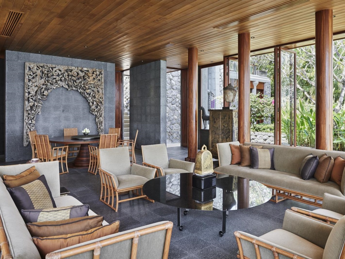 Living area in an ocean villa with seating and coffee table