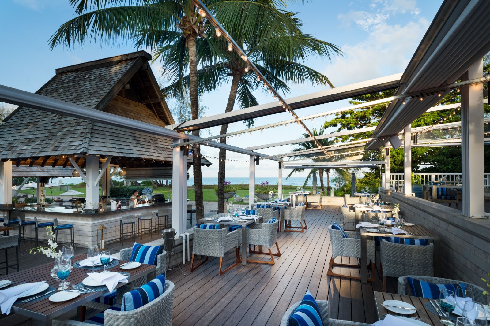 Outdoor restaurant terrace at Anantara Mai Khao Phuket Villas in Thailand