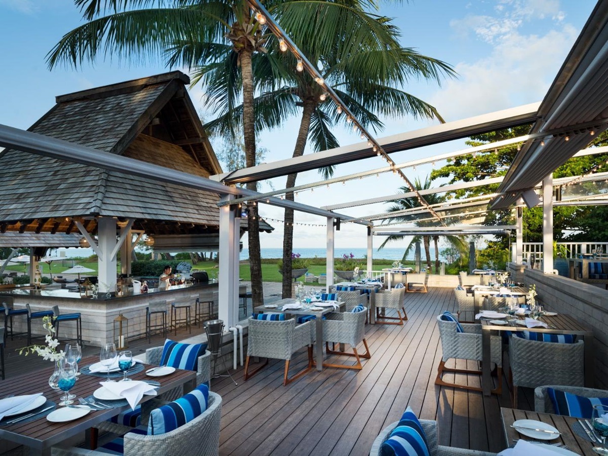 Outdoor restaurant terrace at Anantara Mai Khao Phuket Villas in Thailand