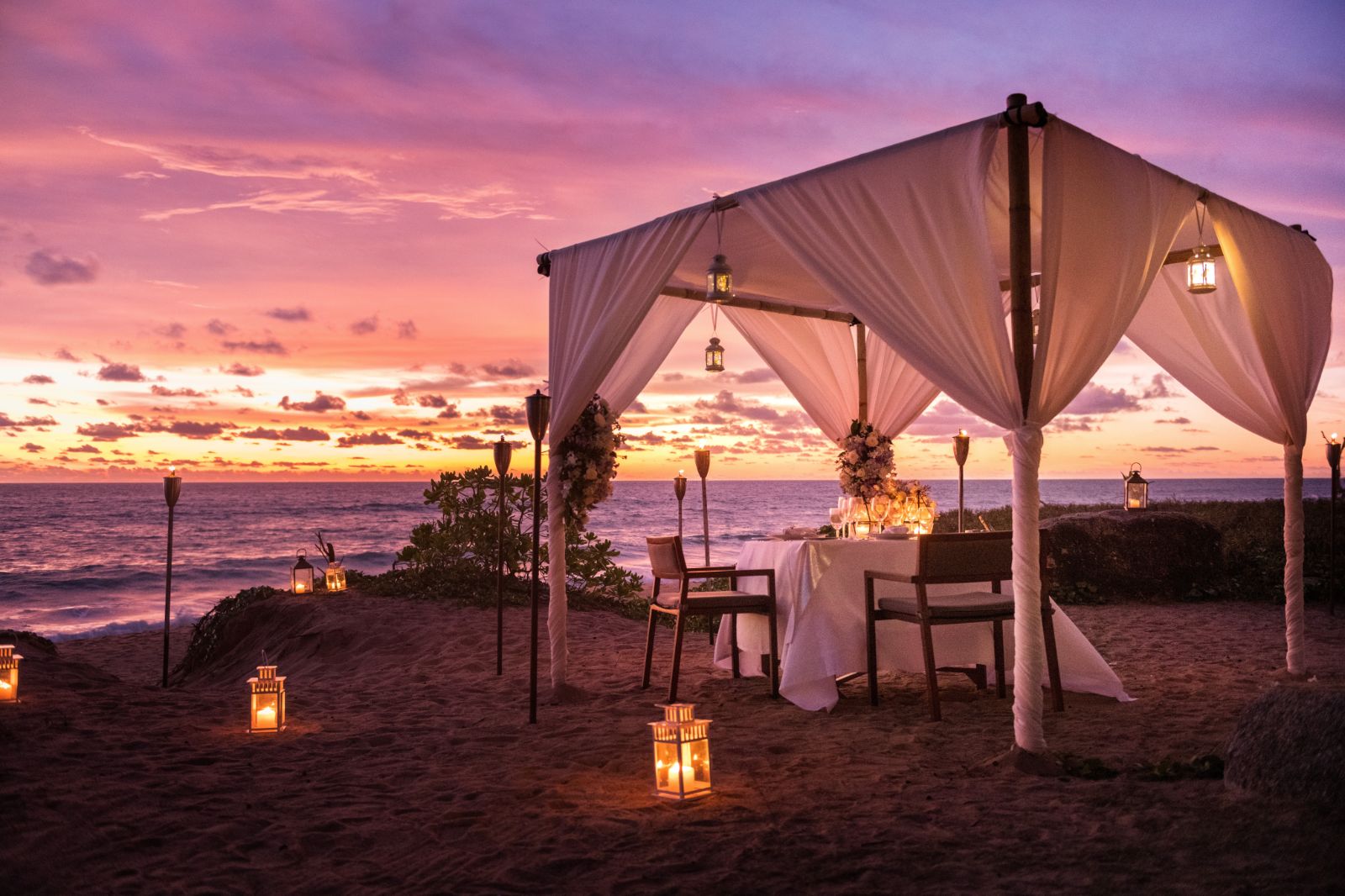 Private beach dining at Anantara Mai Khao Phuket Villas in Thailand