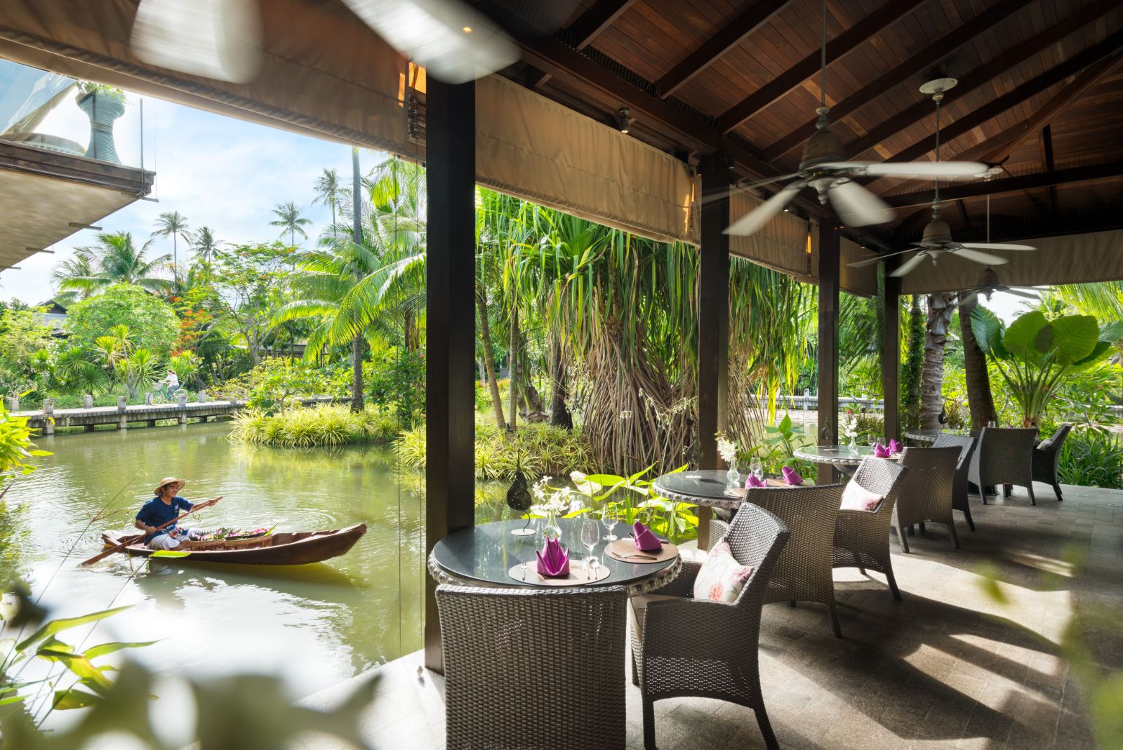 Seating on the river of Anantara Mai Khao Phuket Villas in Thailand