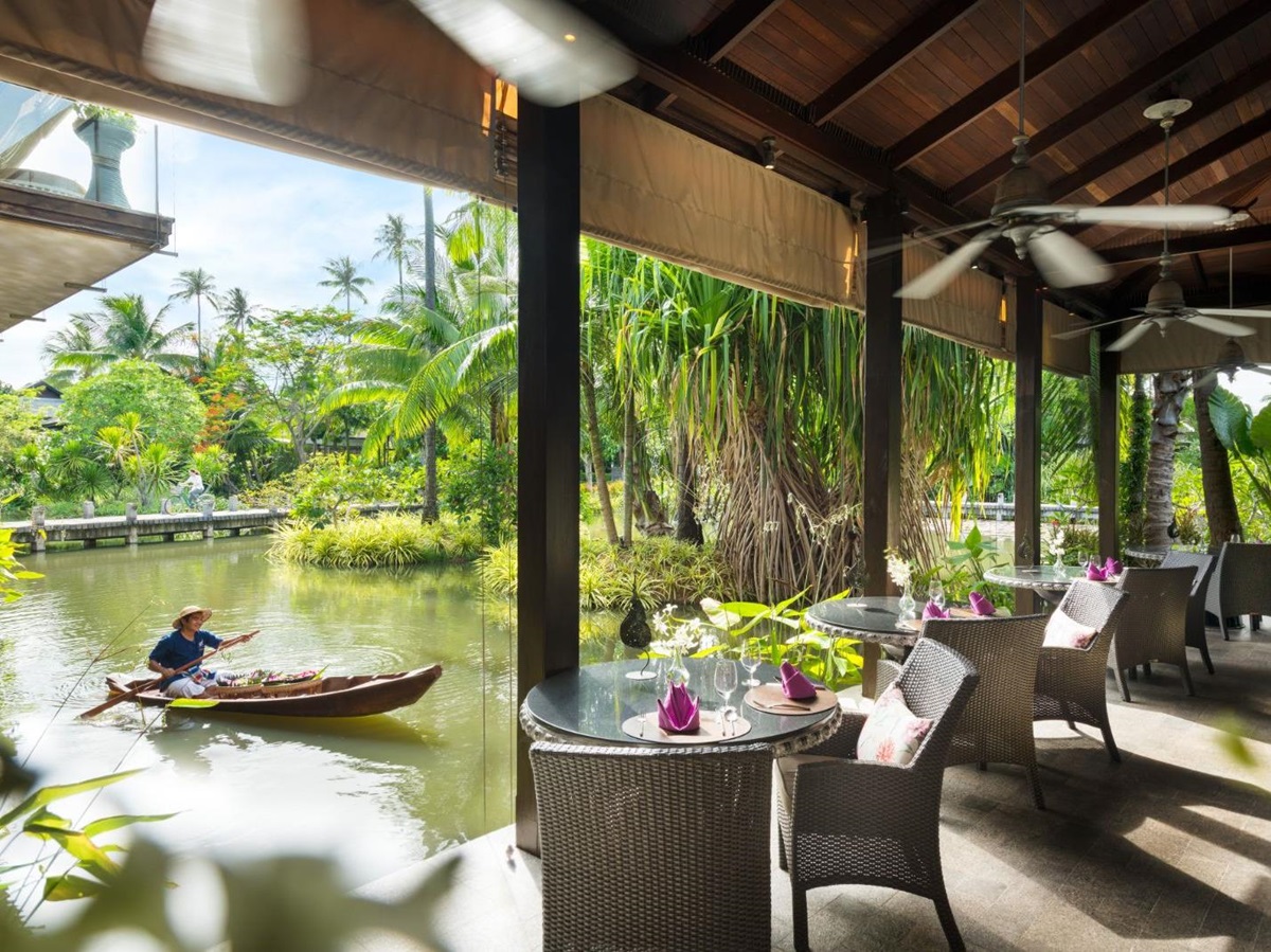 Seating on the river of Anantara Mai Khao Phuket Villas in Thailand